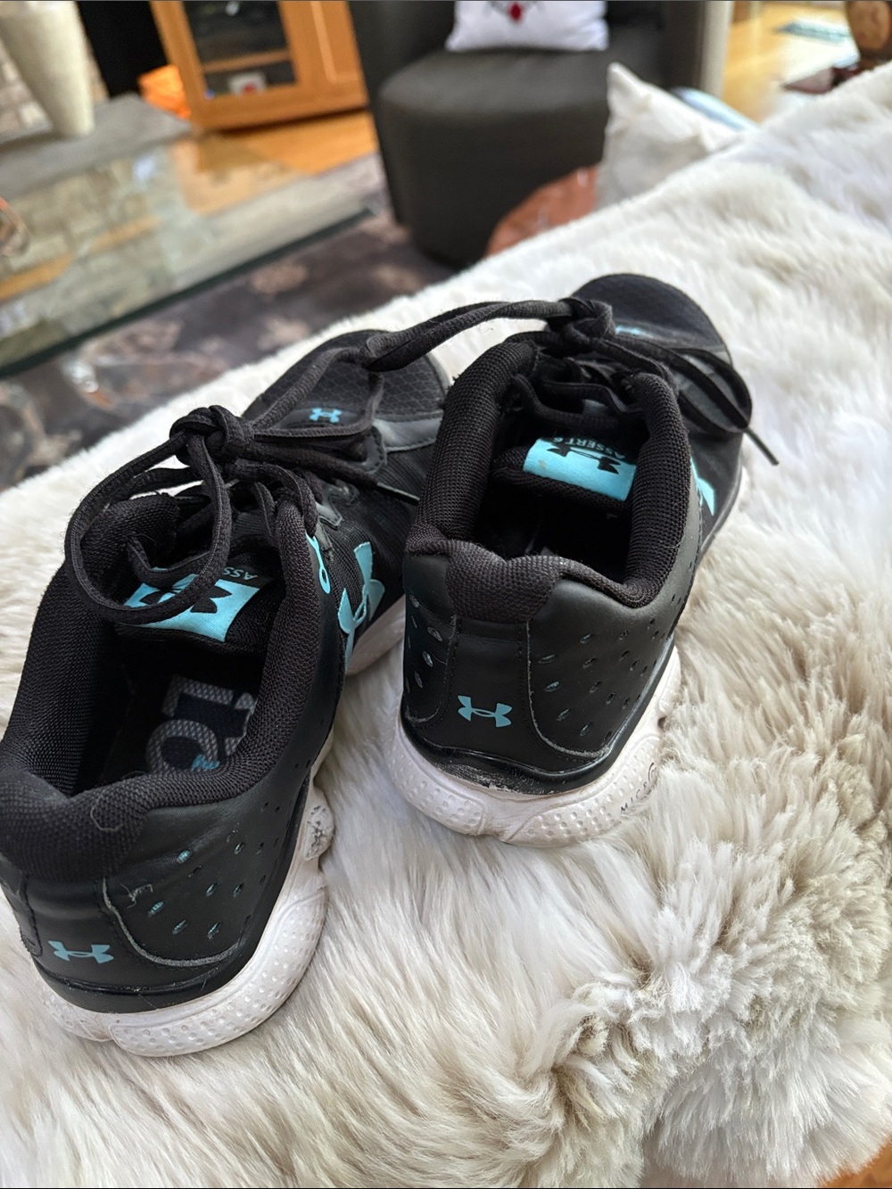Under Armour woman’s Black and Teal Athletic Sneakers